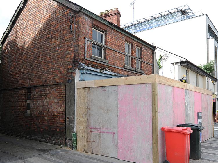 Long standing Market Square building in Dundalk being demolished 