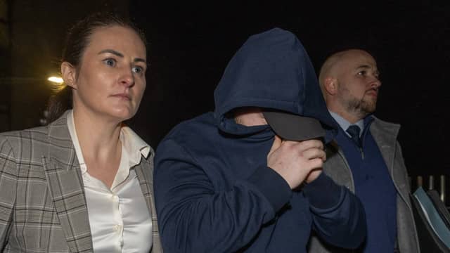 Garda Gráinne McLoone and Garda Patrick Kelly accompany