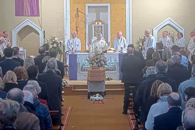 “She was my medicine. Let's remember her like that, let's celebrate her, share stories about her and laugh - that's all she wanted. So let's make that promise to her today,” concluded Jeremy to warm and sustained applause as he retook his seat, again pausing to gently touch his wife’s coffin.
