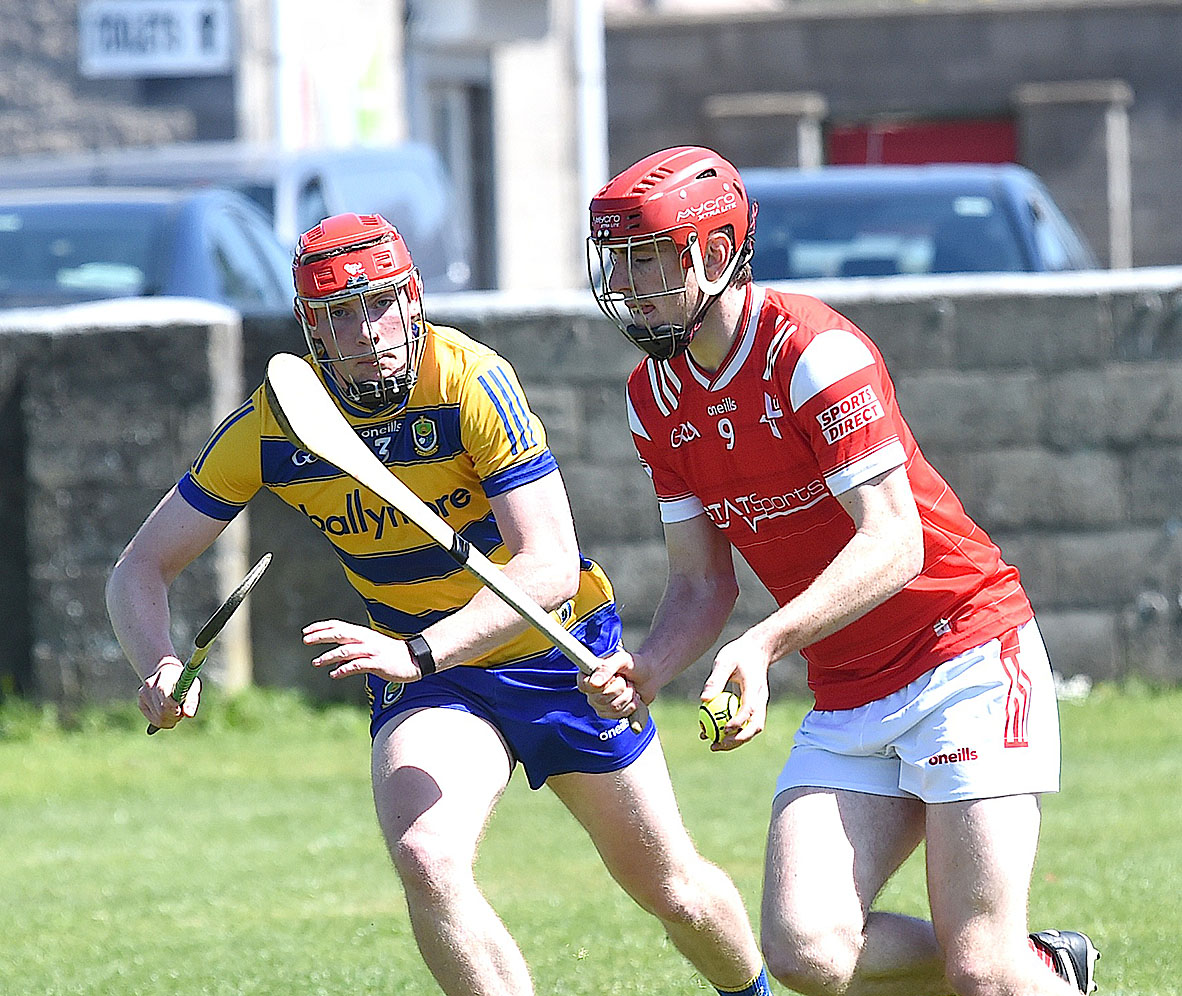 Louth midfielder Conor Murphy taking on Roscommon's James Dillon in the Nicky Rackard Cup game in St. Brigid's Park. Photo by Arthur Kinahan.