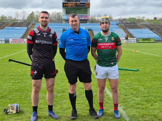 Louth senior hurling captain, Conor Clancy (left), with Mayo captain, David Kenny, and referee Michael Connolly. Picture by Louth GAA