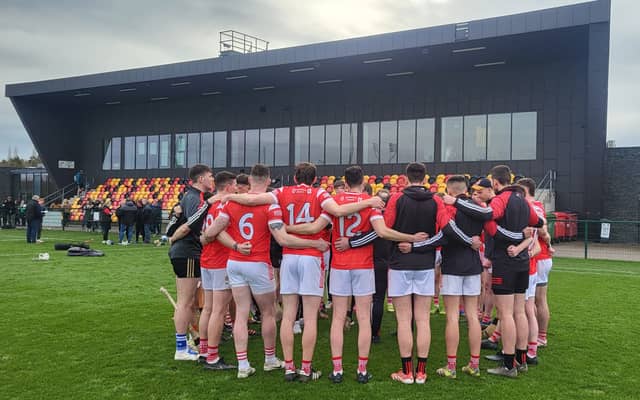 The Louth senior hurling team in their post-match huddle after defeating Lancashire at Abbotstown. Picture by Anthony Bravender