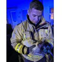 Fire fighter Carrick saving Biscuit the cat's life