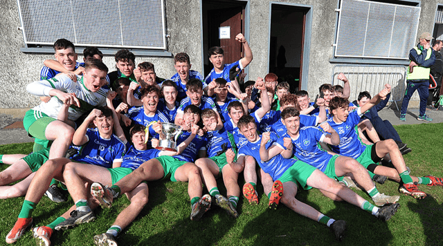 St. Patricks players celebrate after winning the minor football championship against Cooley Kickhams. Picture by Arthur Kinahan.