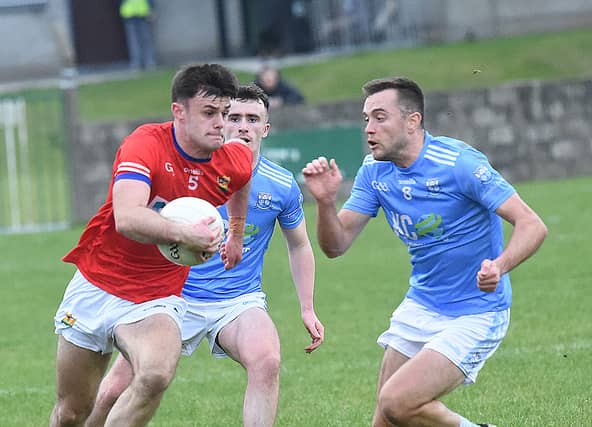 Jonathan Commins St Marys taking on Andy McDonnell Newtown Blues in the Anchor Tours Senior semi final in McGeough Park Haggardstown. Photo: Arthur Kinahan