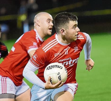 Padraic Downey leading a St. Nicholas attack. Picture by Arthur Kinahan