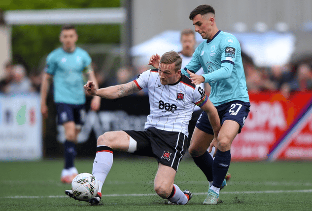 John Mountney of Dundalk in action against Dean McMenany of Waterford. Photo by Shauna Clinton/Sportsfile