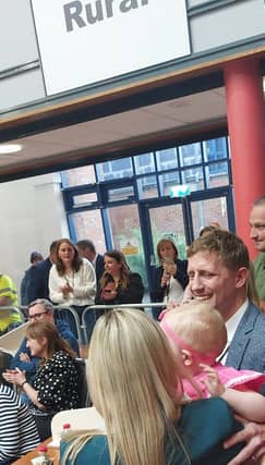 Eric Donovan celebrating with his family