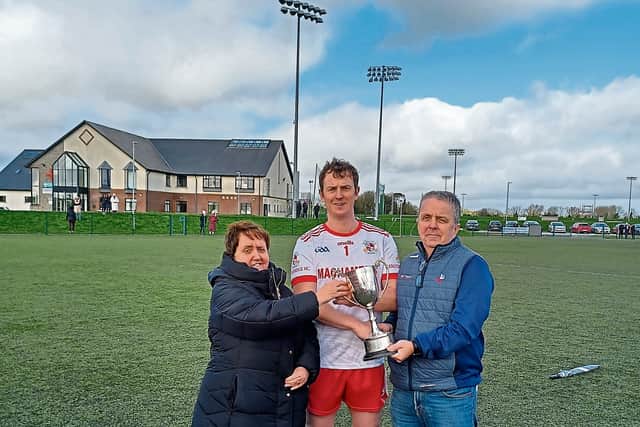 Afterwards Josephine Maguire and Maurice Murphy presented the 'Maurice Murphy Cup' to the winners captain Conor Kerrigan.