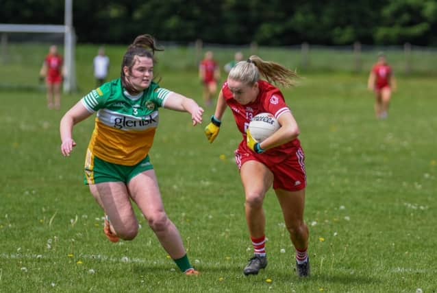 Aoife Russell, the scorer of both of Louth's goals, getting the better of Offaly's Ava Dolan. (Pictures: Warren Matthews Photography)