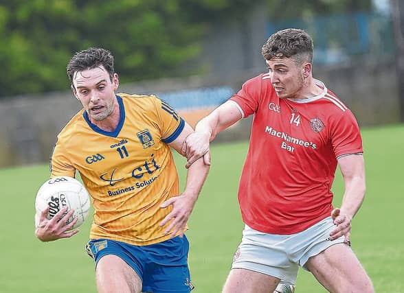 Darren McMahon St Mochtas has the beating of St Brides Sean Marry. Pic Arthur Kinahan