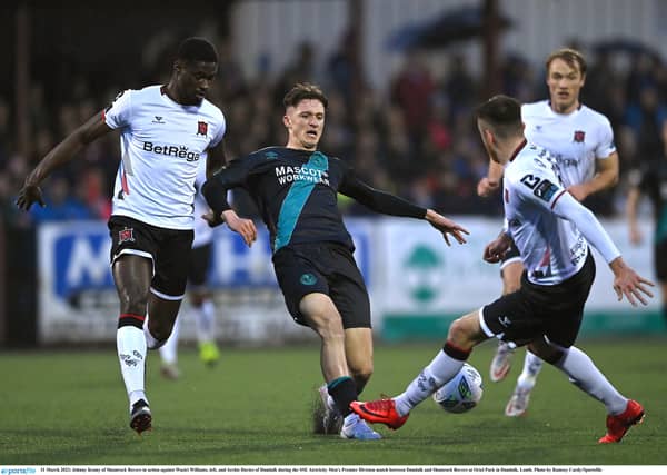 Johnny Kenny of Shamrock Rovers in action against Wasiri Williams, left, and Archie Davies of Dundalk . (Picture: Sportsfile)