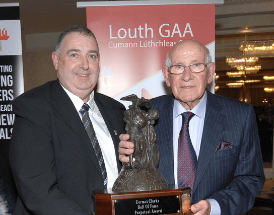Jim McArdle of Roche Emmets receiving the Dermot Clarke Louth GAA Hall of Fame Award from Dermot Clarke Jnr. (Picture: Arthur Kinahan)