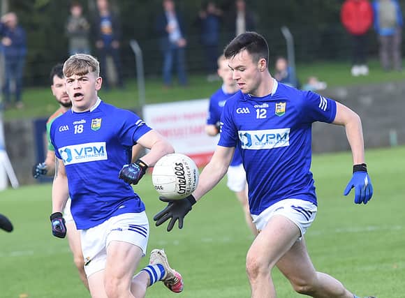 Liam Jackson on the attack for St Marys, supported by Evan Malone. (Picture: Arthur Kinahan)