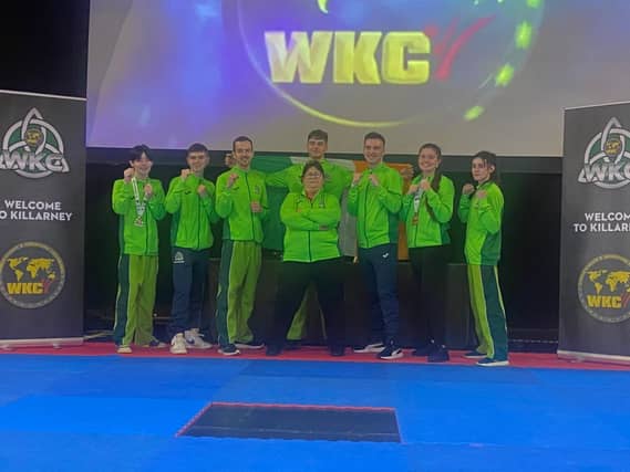 The Cobra Kan Karate Club pose for a photo during the recent World Championships. They came home with 13 medals