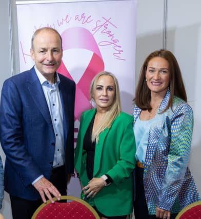Taoiseach Micheál Martin, Cllr Teresa Costello and Senator Erin McGreehan at the Breast Cancer Awareness Stand at FF Ard Fheis in RDS, Dublin