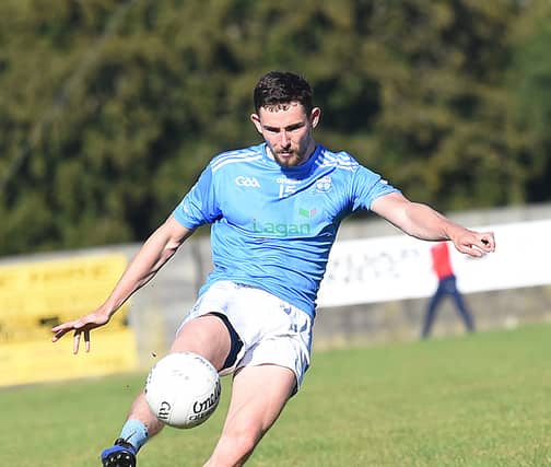 Ciaran Downey tries for a Newtown Blues score against St Patrick's during the group stages of the championship. (Pic: Arthur Kinahan)