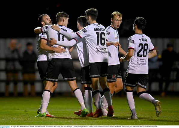 Robbie Benson of Dundalk, left, celebrates with his teammates after scoring their side's third goal, a penalty. (Pic: Sportsfile)