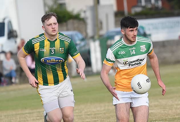 Craig Doherty, ST Josephs, getting away from Clan Na Gael's Gerard Curran during a recent Div 2 league game in Dromiskin. (Pic: Arthur Kinahan)