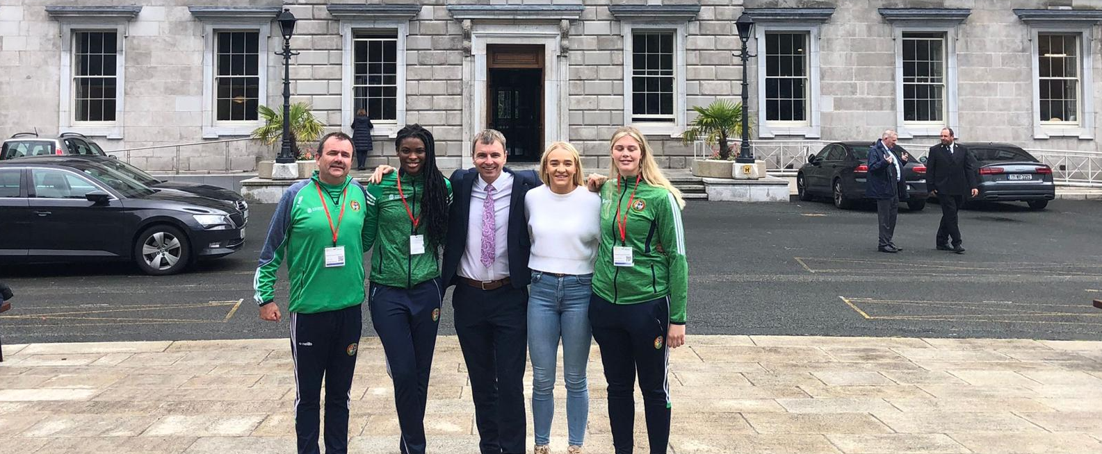 Boxers Amy Broadhurst, Dearbhla Tinnelly, Evelyn Igharo and Clann Naofa boxing clubcoach Jim O'Neil alongside Louth Sinn Fein TD Ruairí Ó Murchú at Leinster House