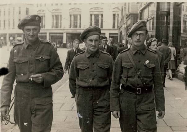 John Kelly, Thomas Meagher and Paul Walsh pictured in Cork City in 1940. They were in Youghal for a training camp with the LDF.