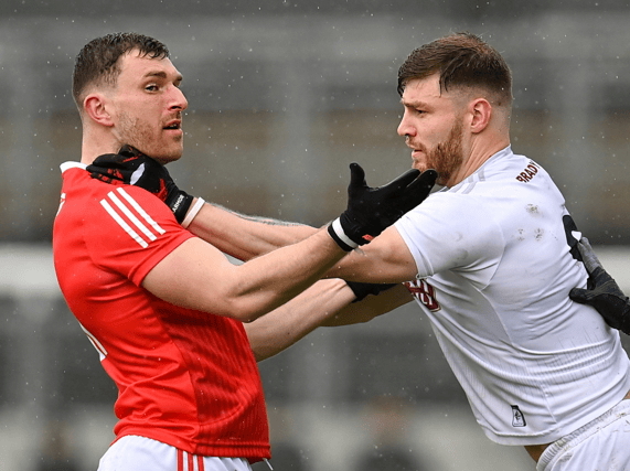 Sam Mulroy and Kevin O’Callaghan of Kildare tussle off the ball during the Leinster Football Championship Quarter-Final. (Pic: Seb Daly/Sportsfile)