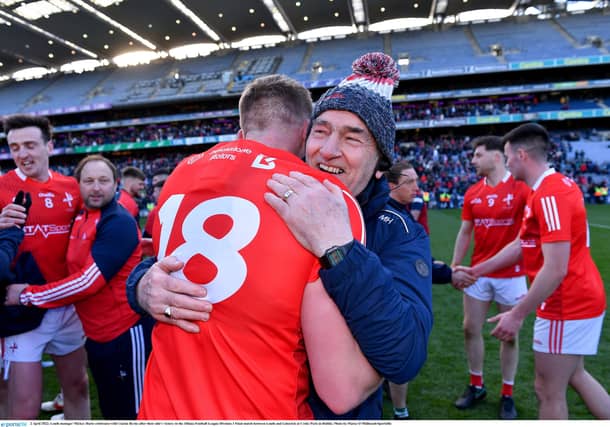 Louth manager Mickey Harte celebrates with Ciarán Byrne after their Allianz Football League Division 3 triumph. (Pic: Sportsfile)