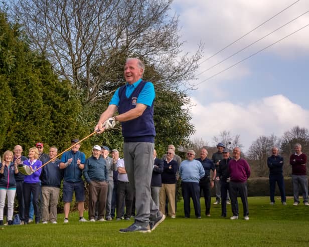 Senior Captain Jimmy McMahon tees off at the Senior Captains Drive In at Mannan Castle