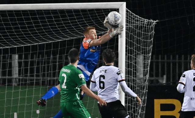 Dundalk goalkeeper Nathan Shepperd makes a save during the Premier Division match between Dundalk and Finn Harps. (Photo: Ramsey Cardy/Sportsfile)