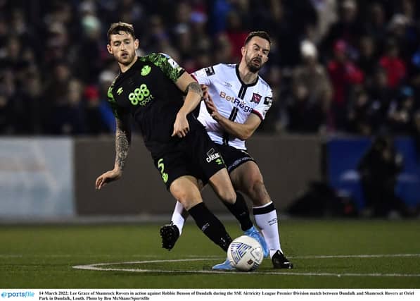 Lee Grace of Shamrock Rovers in action against Robbie Benson of Dundalk. (Pic: Ben McShane/Sportsfile)