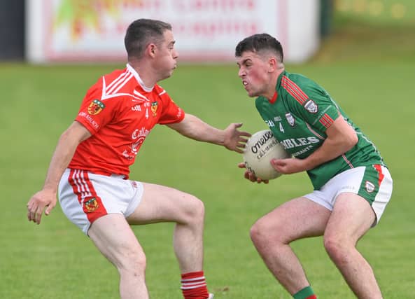 James Butler, left, hit 3-7 for Glen Emmets as they accounted for John Mitchels. (Pic: Arthur Kinahan)