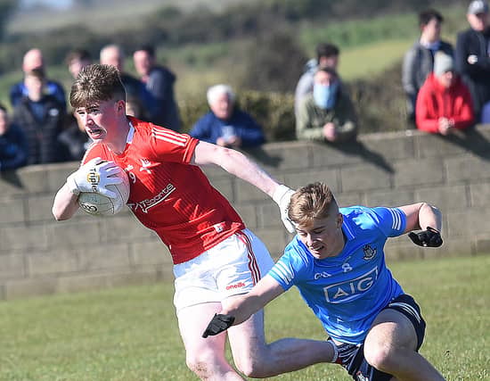 Sean Callaghan, Louth, has the beating of Dublin's Dylan Clarke. (Pic: Arthur Kinahan)