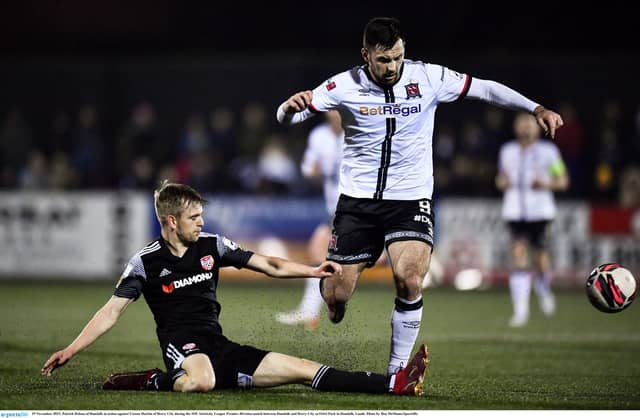 Patrick Hoban of Dundalk in action against Ciaron Harkin of Derry City. (Pic: Ben McShane/Sportsfile)