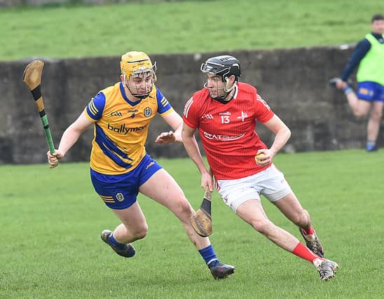 Conor Dean, Louth, taking on Roscommon's Ronan Kilcline. (Photo: Arthur Kinahan)