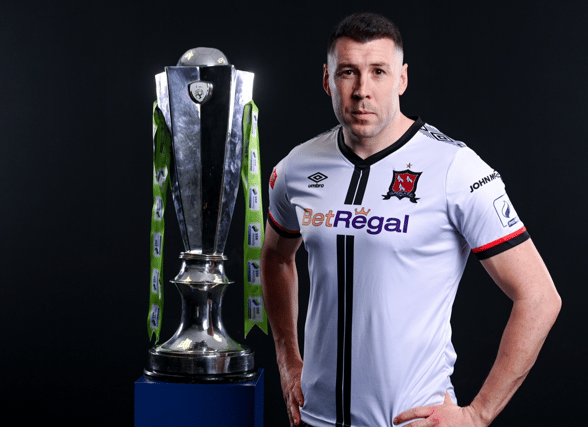 Brian Gartland with the SSE Airtricity League Premier Division trophy at the launch of the league. (Pic: Harry Murphy/ Sportsfile)