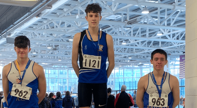 St Peter's Rory McLoughlin recieving his Gold medal after finishing first in the U19 800M Race