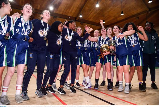 The St Louis Girls Team celebrate following their win in the U16 C Schools Cup Final held at the National Basketball Arena in Dublin. (Pic: Ben McShane/Sportsfile)