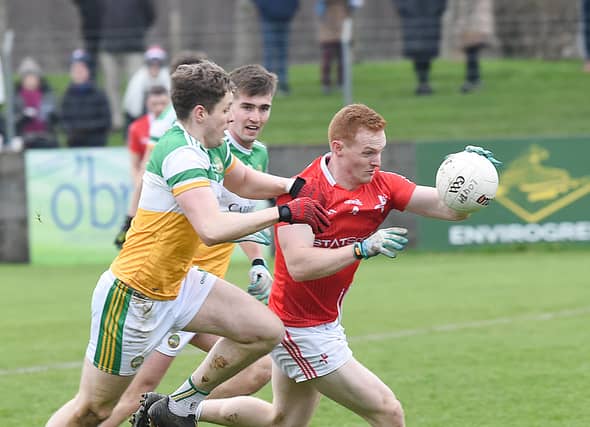 Donal McKenny taking on the Offaly defence. (Photo: Arthur Kinahan)
