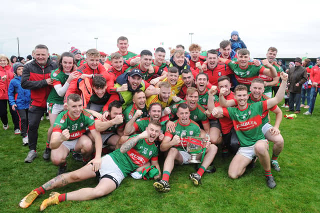 The Glen Emmets team celebrate following their win over John Mitchels. (Pic: Arthur Kinahan)