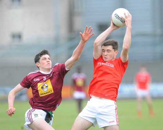Fionn Cumiskey of Louth fielding a high ball from Westmeath's David O'Reilly in last Saturday's Leinster Minor Championship game in Mullingar