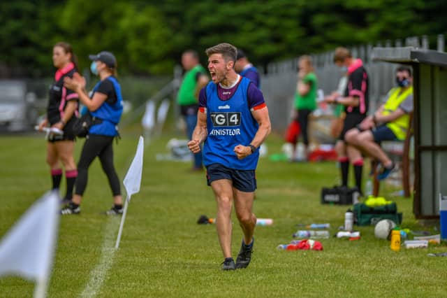 Louth manager Wayne Freeman celebrates from the sidelines as his side secured their spot in the Division Four League Final. Pic: Warren Matthews