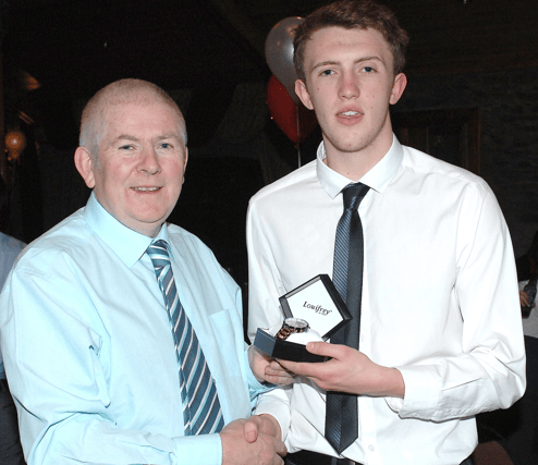 Hunterstown Rovers' Malachy McKenna with Ryan Burns, the club's former minor footballer of the year. (Pic: Arthur Kinahan)