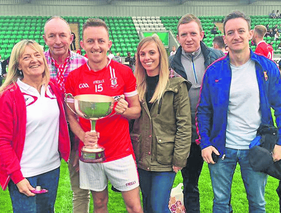 Annette, Benny, Fiachra, Éanna and Conall McArdle with Fiachra's wife, Lisa, after Cuchulainn's 2017 London IFC final win.