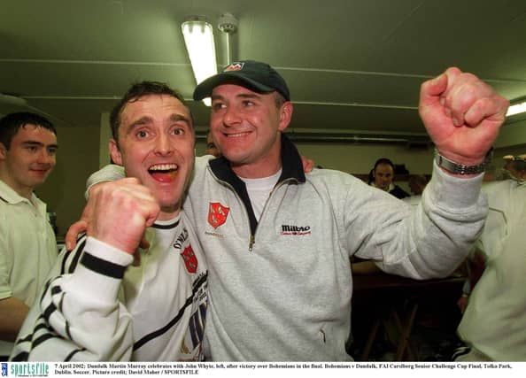 John Whyte, with Martin Murray, won an FAI Cup medal with Dundalk FC 16 years after tasting Louth GAA MFC success with Roche Emmets. (Pic: Sportsfile)