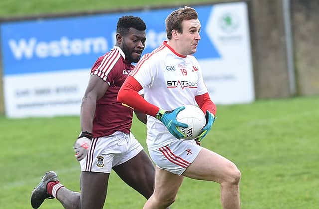 Louth's Eoghan Duffy strides away from Boidu Sayeh of Westmeath during Saturday afternoon's O'Byrne Cup encounter at Drogheda's Gaelic Grounds.