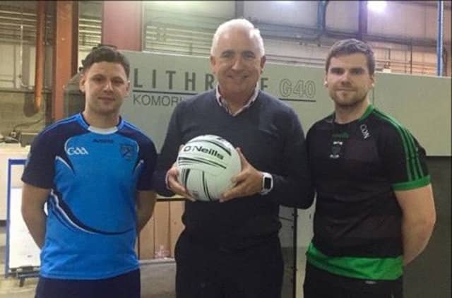 Team captains Trevor O'Brien (Glyde Rangers) and Cian O'Nairaigh (Dundalk Young Irelands) with Anglo Printers MD Padraic Kierans ahead of Sunday's Anglo Printers JFC final.