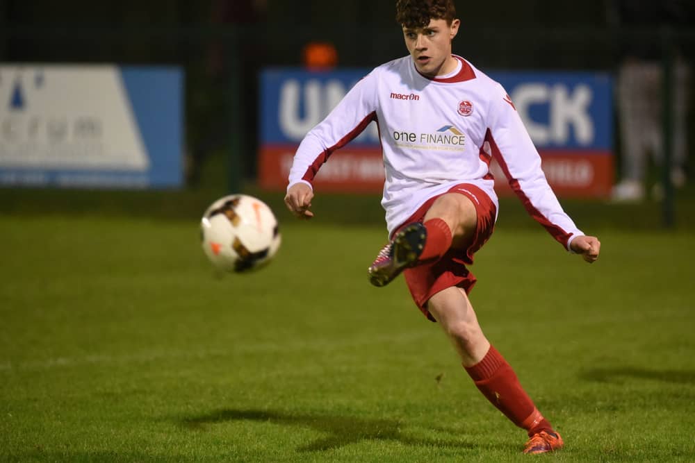 Rock Celtic's Odhran Duffy knocks the ball up the line. (Pic: Ciarán Culligan)