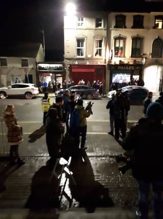 A crowd of people had gathered on the street waiting for the accused teenager Mohamed Morei to arrive.