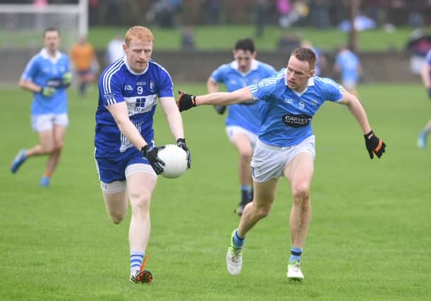 Dundalk Gaels' Seán McCann and John Kermode of Newtown Blues. (Pic: Ciarán Culligan)