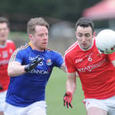 Liam Dullaghan of Louth contests this ball with Longford's Sean McCormack